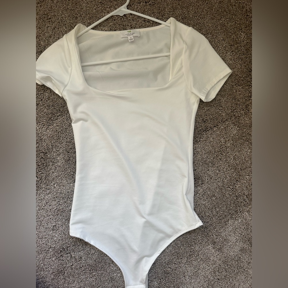 free people white bodysuit!